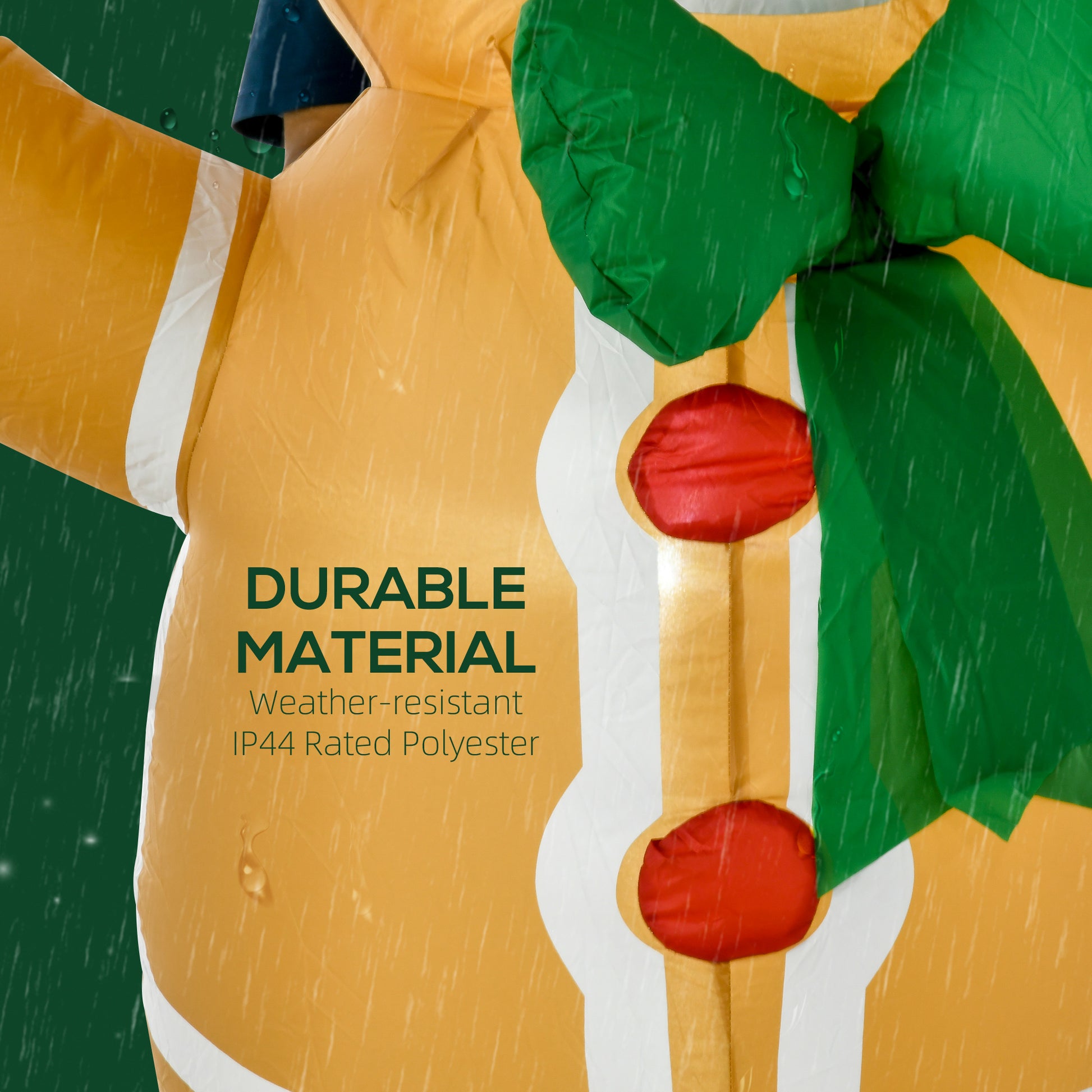 Close-up of inflatable gingerbread man decoration with green bow and red buttons in rain