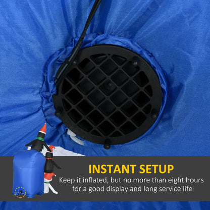 Close-up of black fan base and blue fabric bottom of an inflatable Christmas mailbox with penguins