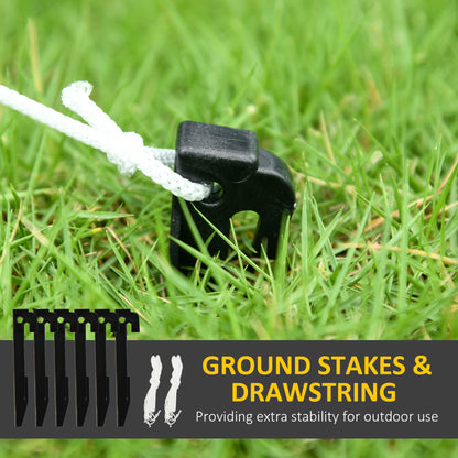 Black plastic ground stake with white drawstring tied on green grass for outdoor stability