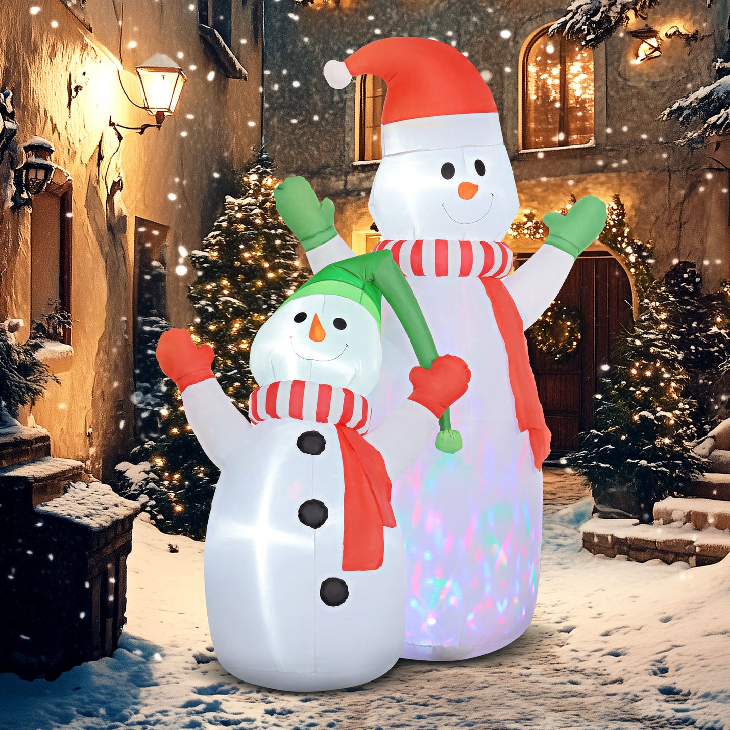 Two glowing inflatable snowmen with scarves and hats in snowy yard Christmas decoration