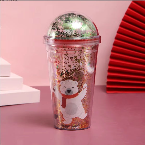Christmas-themed water cup with glitter, featuring a smiling polar bear in a red scarf and dome lid