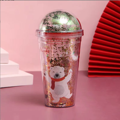 Christmas-themed water cup with glitter, featuring a smiling polar bear in a red scarf and dome lid