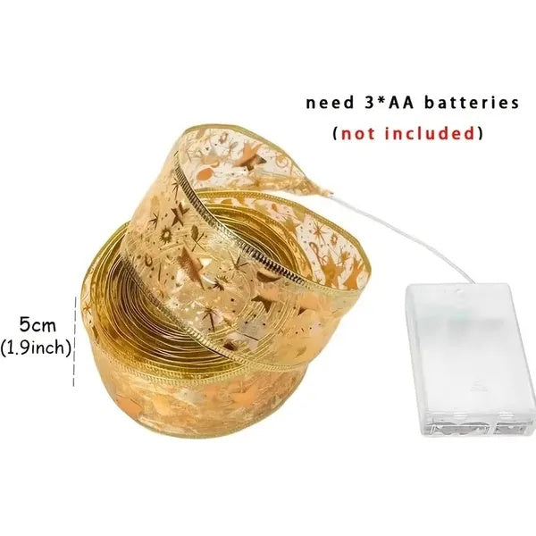 gold mesh Christmas ribbon with star and reindeer patterns, connected to transparent battery pack