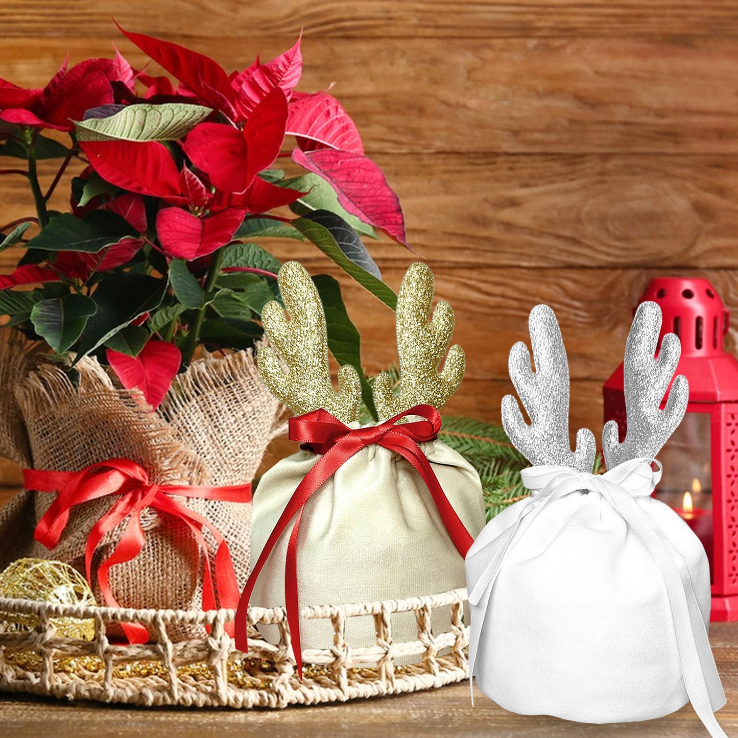 Khaki and white Christmas fabric gift bags with glitter antler decorations and ribbon ties, festive holiday decor