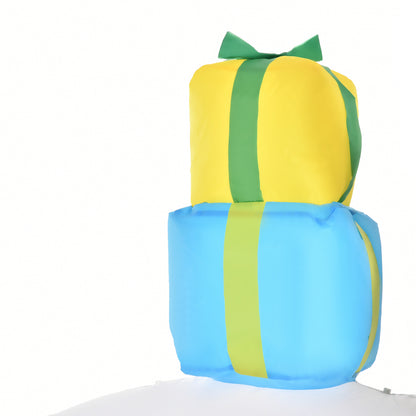 Inflatable outdoor Christmas decoration of stacked yellow and blue gift boxes with green ribbons