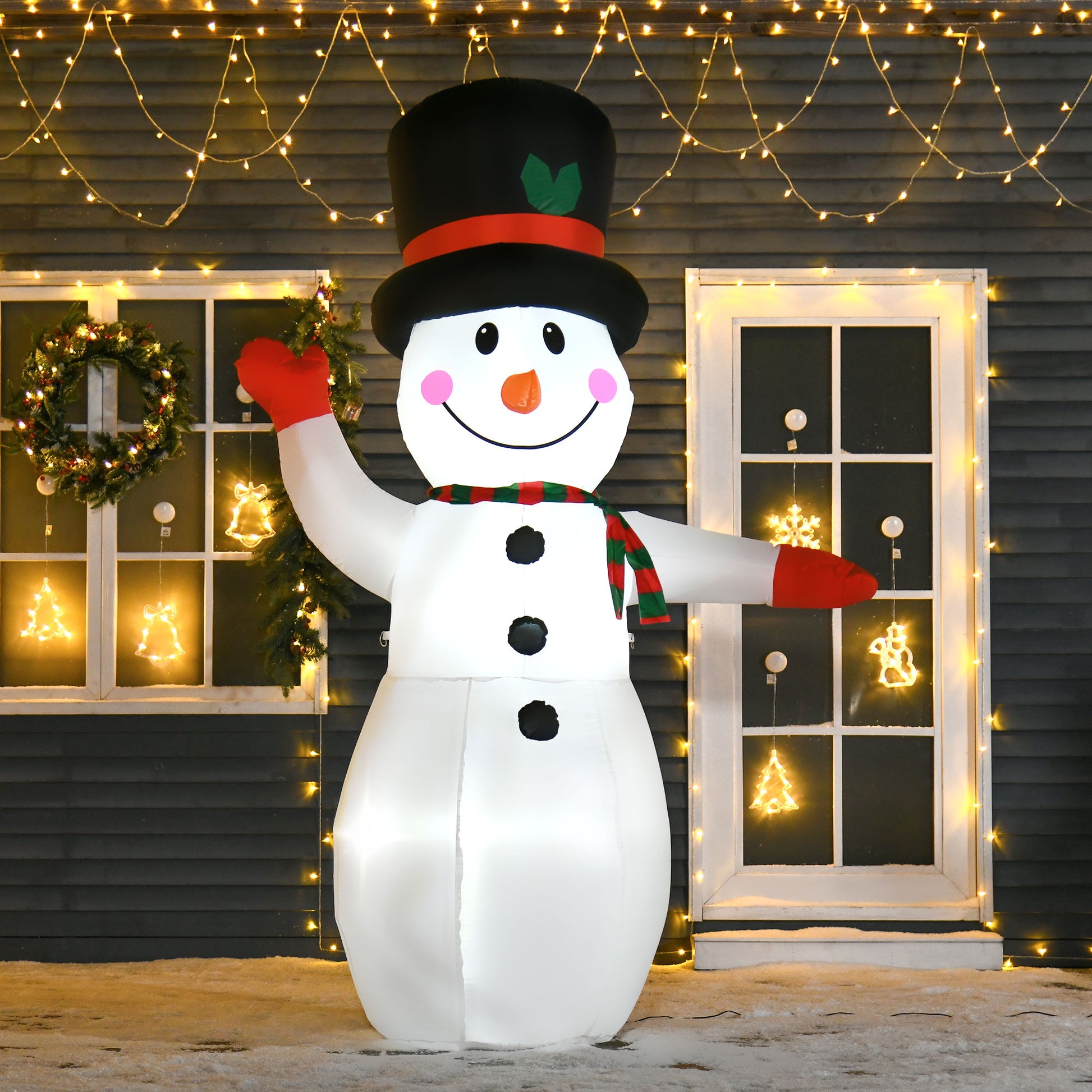 8ft inflatable snowman with black top hat, red gloves, and striped scarf in snowy yard with Christmas lights