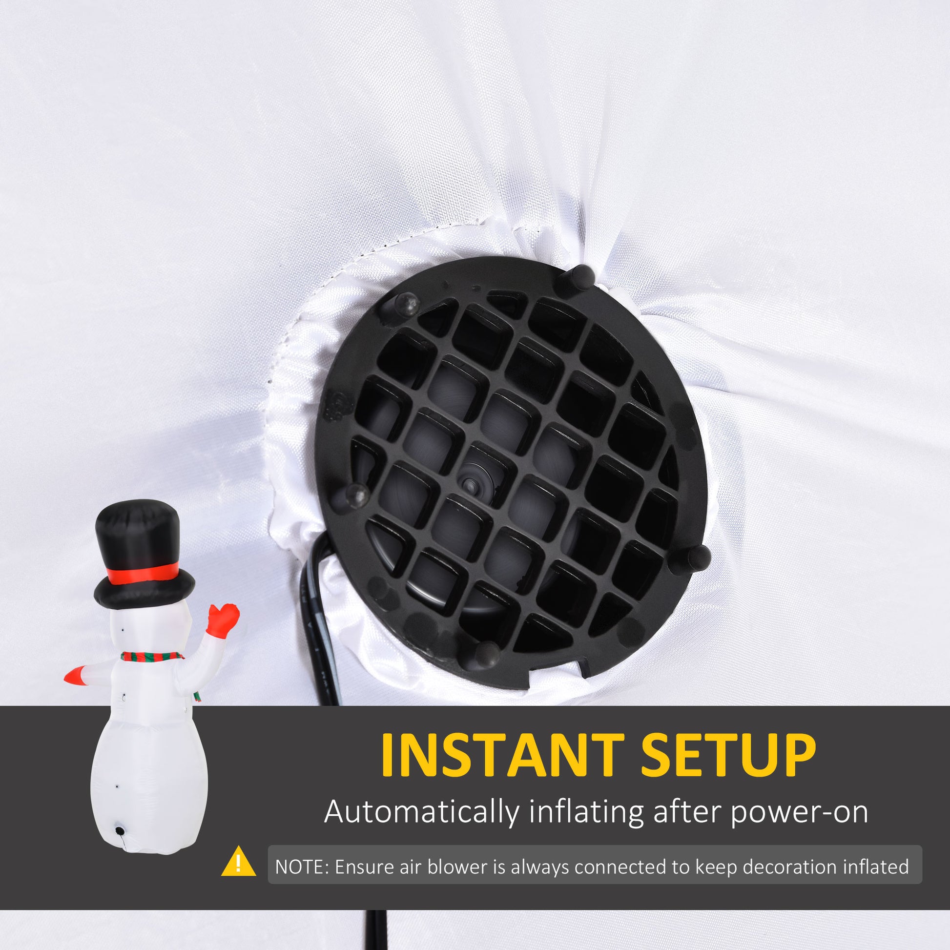 Close-up of black air blower vent on white fabric for instant inflatable snowman decoration setup