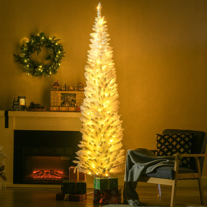 Slim white artificial Christmas tree with warm white LED lights near fireplace and cozy armchair