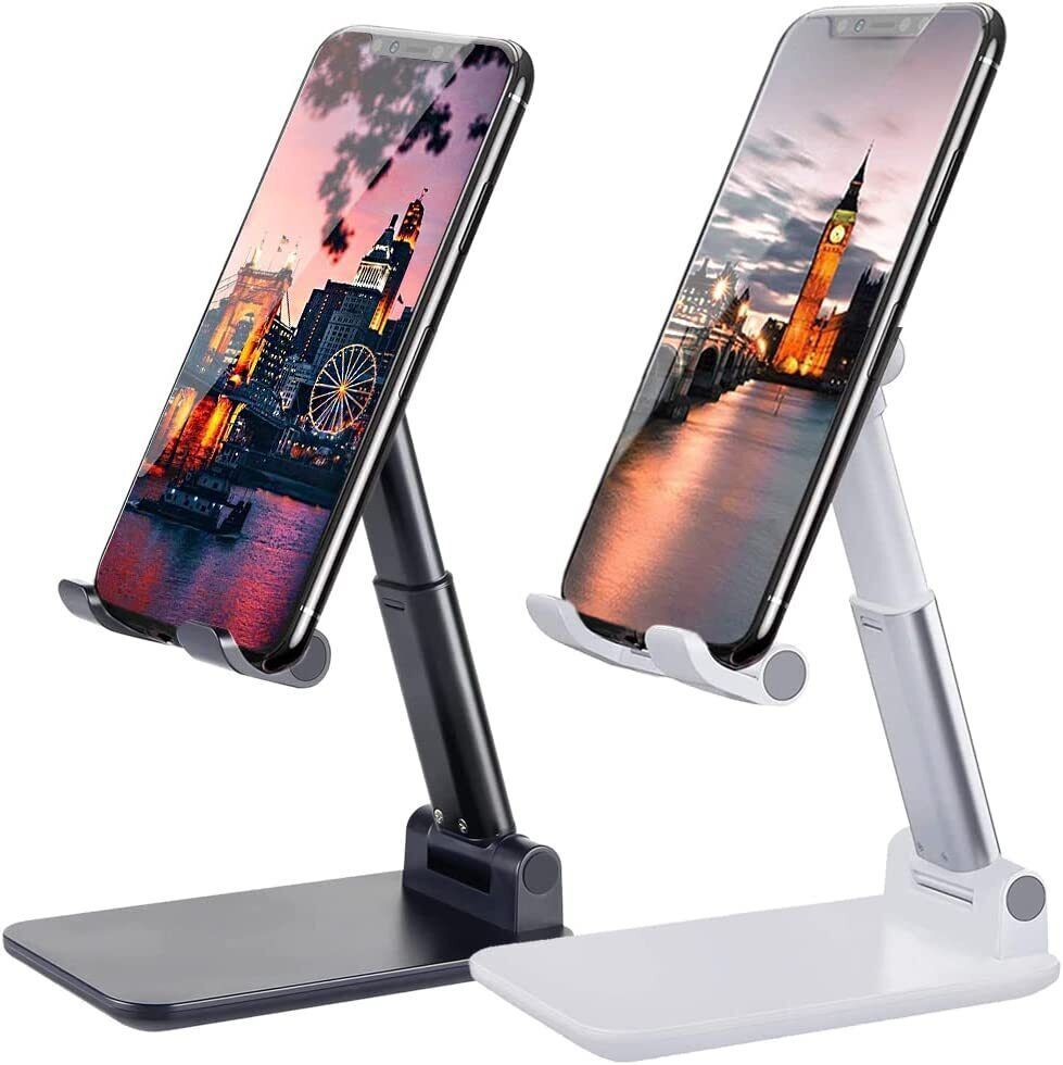 Black and white adjustable aluminum phone stands holding smartphones with cityscape screens